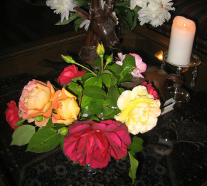 The last roses from the garden were brought indoors to make this small but cheerful bouquet.